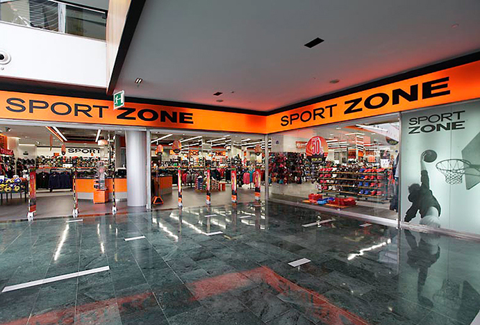 El propietario de Sport Zone reduce beneficios en el primer semestre